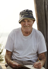 Larry Tuthill on the cabin porch